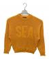 WIND AND SEA（ウィンダンシー）の古着「メッシュニット」｜オレンジ