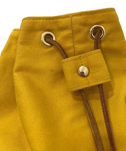 HERMES（エルメス）HERMES (エルメス) 巾着ショルダーバッグ イエローの古着・服飾アイテム