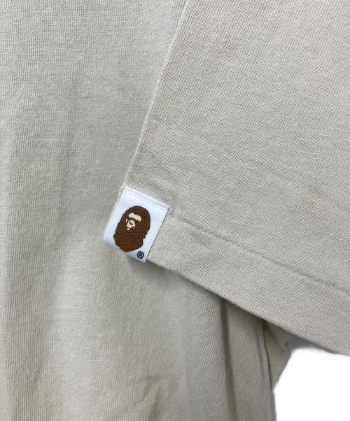 A BATHING APE（アベイシングエイプ）A BATHING APE (アベイシングエイプ) プリントTシャツ ベージュ サイズ:2XLの古着・服飾アイテム