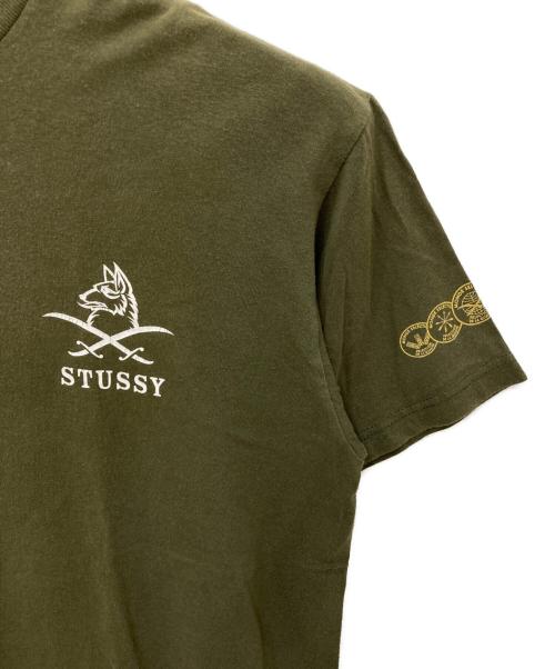 stussy（ステューシー）stussy (ステューシー) プリントTシャツ グリーン サイズ:Lの古着・服飾アイテム
