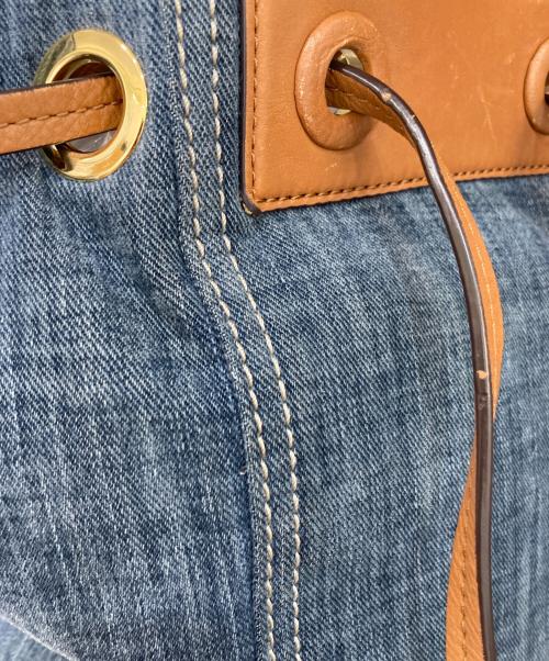 MICHAEL KORS（マイケルコース）MICHAEL KORS (マイケルコース) デニム レザー 巾着リュックサック インディゴの古着・服飾アイテム