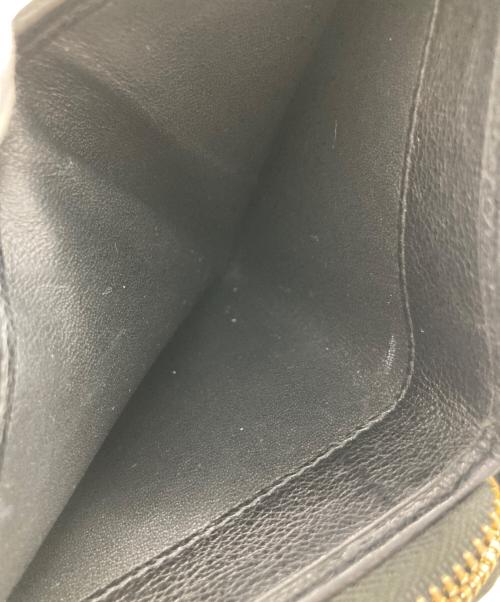 Yves Saint Laurent（イヴサンローラン）Yves Saint Laurent (イヴサンローラン) 2つ折り財布 ブラックの古着・服飾アイテム