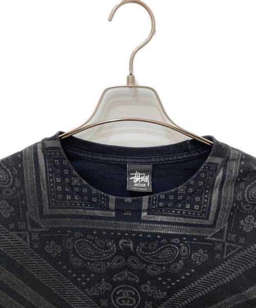 stussy（ステューシー）stussy (ステューシー) TREATED CREW プリントTシャツ ブラック サイズ:Mの古着・服飾アイテム