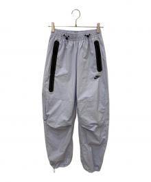 NIKE（ナイキ）の古着「テック メンズ オーバーサイズド ウーブン パンツ」｜パープル