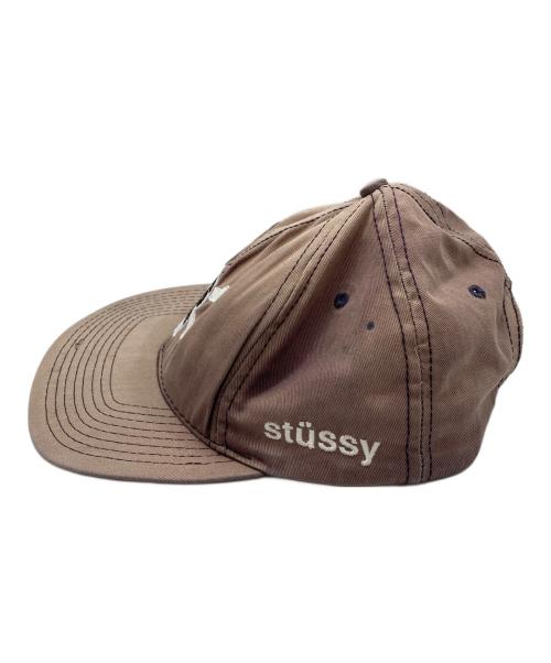 stussy（ステューシー）stussy (ステューシー) フェードスカルキャップ パープルの古着・服飾アイテム