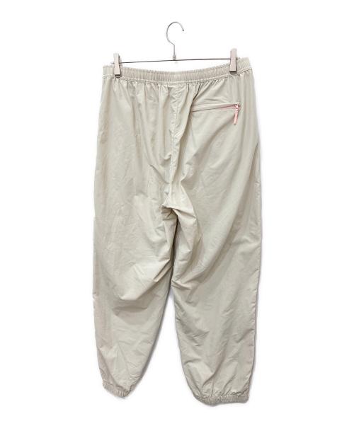 SUPREME（シュプリーム）Supreme (シュプリーム) Contrast Zip Warm Up Pant　コントラストジップウォームアップパンツ ベージュ サイズ:XLの古着・服飾アイテム