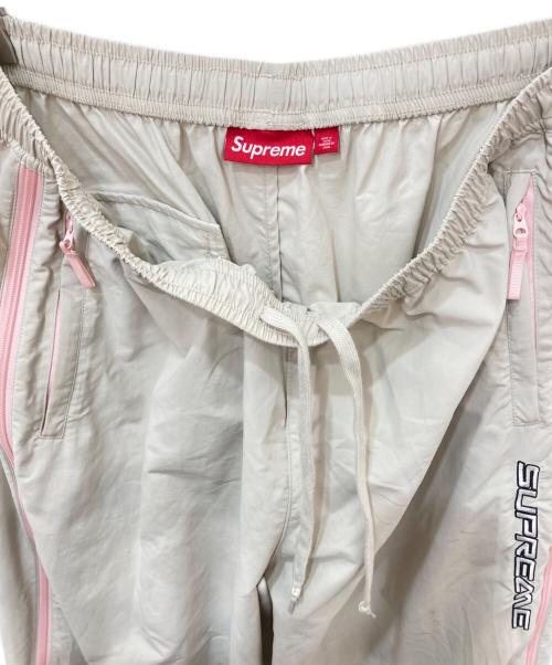 SUPREME（シュプリーム）Supreme (シュプリーム) Contrast Zip Warm Up Pant　コントラストジップウォームアップパンツ ベージュ サイズ:XLの古着・服飾アイテム