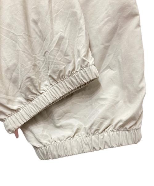 SUPREME（シュプリーム）Supreme (シュプリーム) Contrast Zip Warm Up Pant　コントラストジップウォームアップパンツ ベージュ サイズ:XLの古着・服飾アイテム