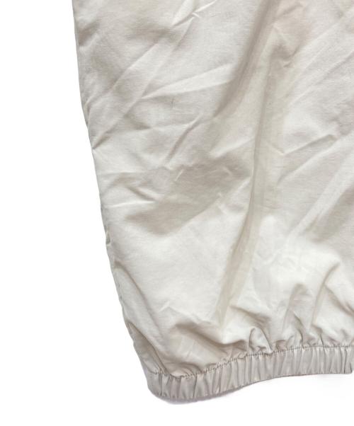 SUPREME（シュプリーム）Supreme (シュプリーム) Contrast Zip Warm Up Pant　コントラストジップウォームアップパンツ ベージュ サイズ:XLの古着・服飾アイテム