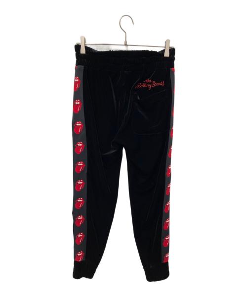 ROLLING STONES（ローリングストーンズ）ROLLING STONES (ローリングストーンズ) TMT (ティーエムティー) サイドロゴベロアトラックパンツ ブラック サイズ:Sの古着・服飾アイテム