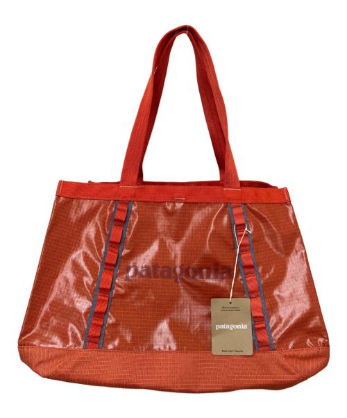Patagonia（パタゴニア）Patagonia (パタゴニア) BLACK HOLE TOTE 25L オレンジ 未使用品の古着・服飾アイテム