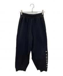 MM6 Maison Margiela（エムエムシックスメゾンマルジェラ）の古着「MARGIELA LOGO PRINTED SWEATPANTS」｜ブラック