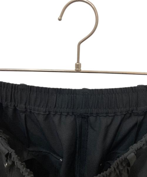 s'yte（サイト）s'yte WASHER FINISHED WOOL GABARDINE STUDS SLIM SAROUEL PANTS　ウォッシャー フィニッシュド ウール ギャバジン スタッズ スリム サルエル パンツ ネイビー サイズ:3の古着・服飾アイテム