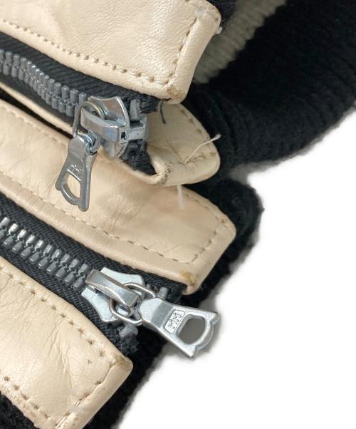 ISAMU KATAYAMA BACKLASH（イサムカタヤマ・バックラッシュ）ISAMU KATAYAMA BACKLASH (イサムカタヤマ・バックラッシュ) レザー切替スタジャン ブラック×ホワイト サイズ:Sの古着・服飾アイテム