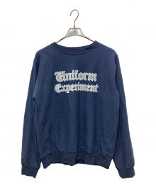uniform experiment（ユニフォームエクスペリメント）の古着「GOTHIC LOGO CREWNECK SWEAT」｜ネイビー