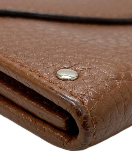 Salvatore Ferragamo（サルヴァトーレ フェラガモ）Salvatore Ferragamo (サルヴァトーレ フェラガモ) ガンチーニターンロックロングウォレット ブラウンの古着・服飾アイテム