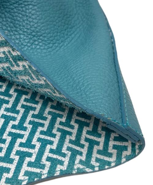 IACUCCI（イアクッチ）IACUCCI (イアクッチ) OPERA ターコイズの古着・服飾アイテム