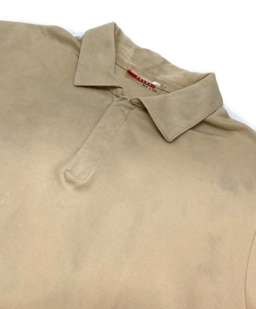 PRADA SPORTS（プラダスポーツ）PRADA SPORTS (プラダスポーツ) ポロシャツ ベージュ サイズ:Mの古着・服飾アイテム