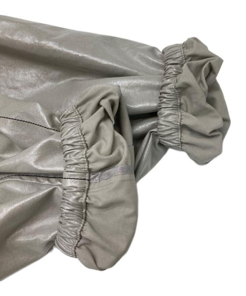 COACH（コーチ）COACH (コーチ) Matin Kim (マーティン・キム) レイヤードコーティングフーディージャンパー グレー サイズ:FREE 未使用品の古着・服飾アイテム