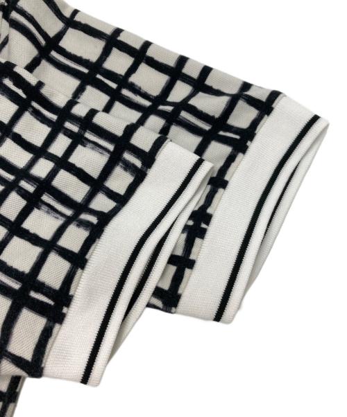 DOLCE & GABBANA（ドルチェ＆ガッバーナ）DOLCE & GABBANA (ドルチェ＆ガッバーナ) ポロシャツ アイボリー×ブラック サイズ:44の古着・服飾アイテム