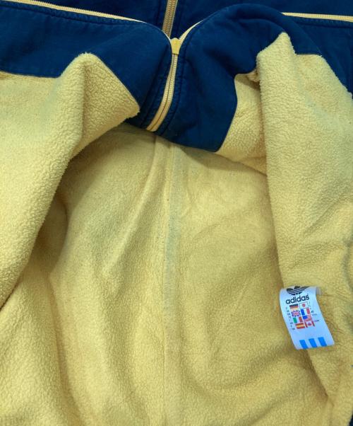 adidas（アディダス）adidas (アディダス) リップストップフーディージャケット ブラック×イエロー サイズ:38の古着・服飾アイテム