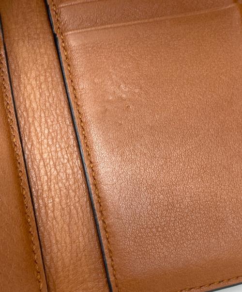 LOEWE（ロエベ）LOEWE (ロエベ) バーティカルウォレット ネイビー×ブラウンの古着・服飾アイテム