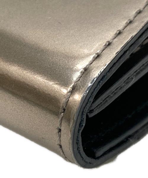 HIROKO HAYASHI（ヒロコ ハヤシ）HIROKO HAYASHI (ヒロコ ハヤシ) OSSO VIVO 薄型長財布 ゴールドの古着・服飾アイテム