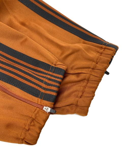 Needles（ニードルズ）Needles (ニードルズ) ジョガートラックパンツ オレンジ サイズ:Sの古着・服飾アイテム