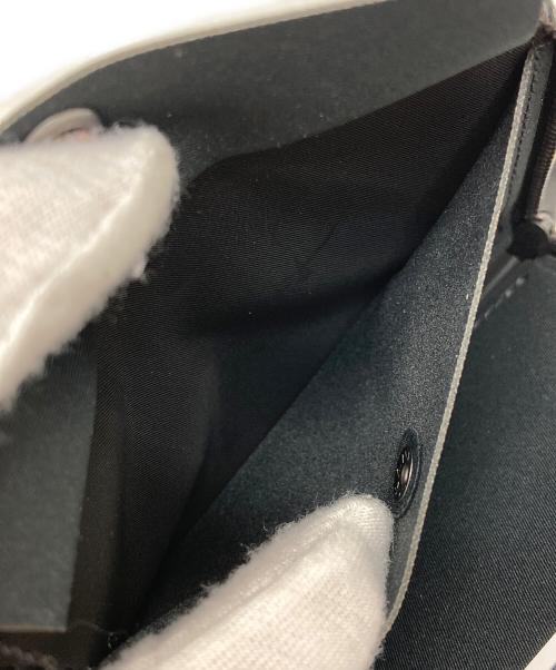 PORTER（ポーター）PORTER (ポーター) WHITE MOUNTAINEERING (ホワイトマウンテ二アニング) ロゴ財布 ネイビー 未使用品の古着・服飾アイテム