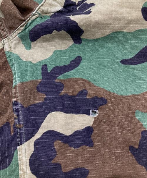 JOSHUA JAMAL（ジョシュア ジャマル）JOSHUA JAMAL (ジョシュア ジャマル) 迷彩 ダメージ 加工 カットオフハーフパンツ オリーブ サイズ:Lの古着・服飾アイテム