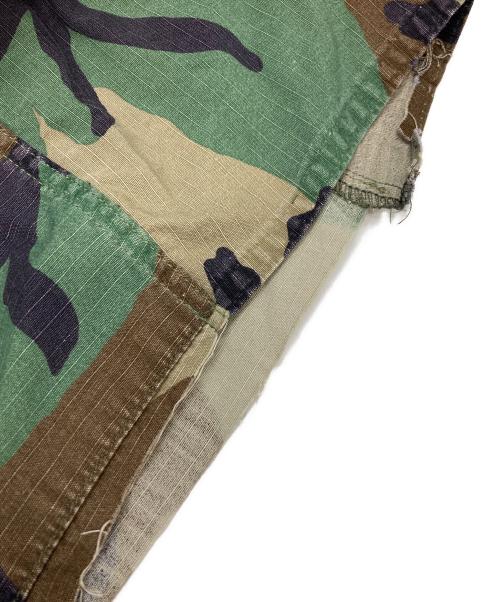 JOSHUA JAMAL（ジョシュア ジャマル）JOSHUA JAMAL (ジョシュア ジャマル) 迷彩 ダメージ 加工 カットオフハーフパンツ オリーブ サイズ:Lの古着・服飾アイテム