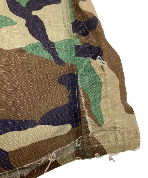 JOSHUA JAMAL（ジョシュア ジャマル）JOSHUA JAMAL (ジョシュア ジャマル) 迷彩 ダメージ 加工 カットオフハーフパンツ オリーブ サイズ:Lの古着・服飾アイテム