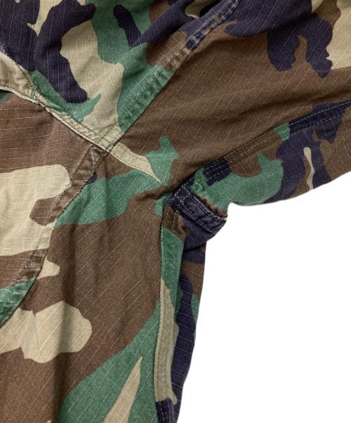 JOSHUA JAMAL（ジョシュア ジャマル）JOSHUA JAMAL (ジョシュア ジャマル) 迷彩 ダメージ 加工 カットオフハーフパンツ オリーブ サイズ:Lの古着・服飾アイテム