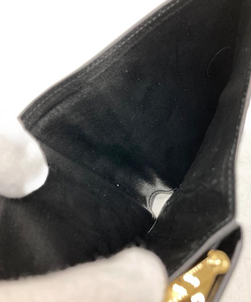 Yves Saint Laurent（イヴサンローラン）Yves Saint Laurent (イヴサンローラン) 2つ折り財布 ブラックの古着・服飾アイテム