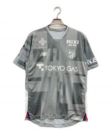 FC東京×NEW BALANCE（エフシートウキョウ×ニューバランス）の古着「Tシャツ」｜グレー