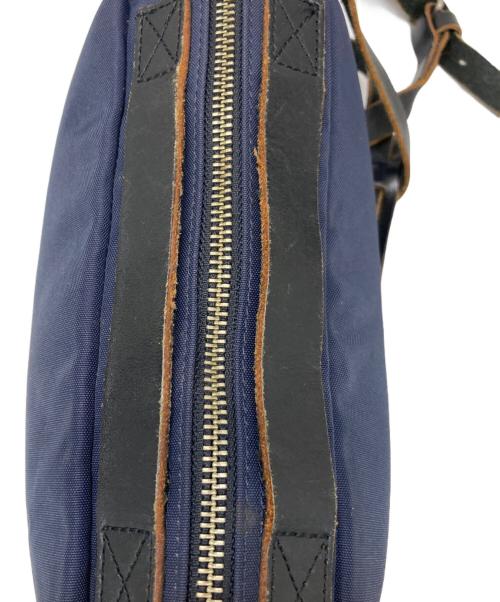 COMME des GARCONS（コムデギャルソン）COMME des GARCONS (コムデギャルソン) レザーナイロンショルダーバッグ ネイビーの古着・服飾アイテム