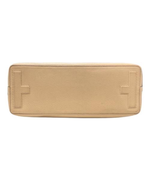 TORY BURCH（トリーバーチ）TORY BURCH (トリーバーチ) パンチングロゴトートバッグ ベージュの古着・服飾アイテム