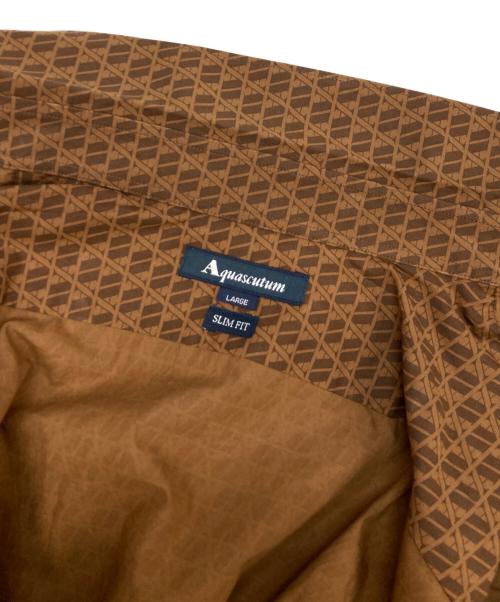 Aquascutum（アクアスキュータム）Aquascutum (アクアスキュータム) モノグラムシャツ ブラウン サイズ:L 未使用品の古着・服飾アイテム