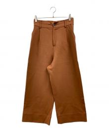 STUDIO NICHOLSON（スタジオ ニコルソン）の古着「SORTE VOLUME PLEAT PANTS」｜オレンジ