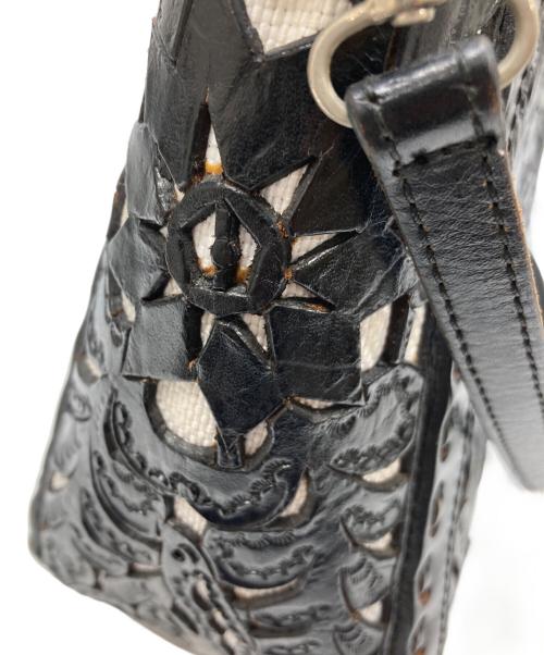 Carving Tribes（カービングトライブス）Carving Tribes (カービングトライブス) 2WAYバッグ ブラックの古着・服飾アイテム