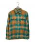Patagonia（パタゴニア）の古着「ネルシャツ」｜グリーン×オレンジ