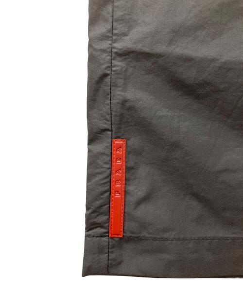 PRADA SPORTS（プラダスポーツ）PRADA SPORTS (プラダスポーツ) ナイロン裾ラバーロゴパンツ ブラック サイズ:48の古着・服飾アイテム