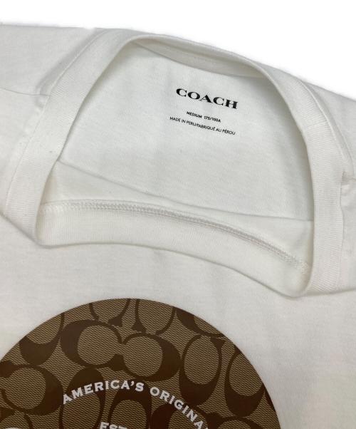 COACH（コーチ）COACH (コーチ) シグネチャーサークルプリントTシャツ ホワイト サイズ:Mの古着・服飾アイテム