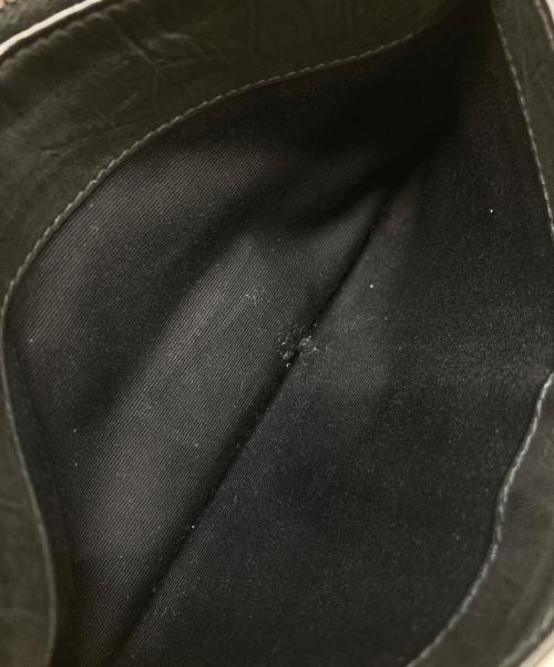 Yves Saint Laurent（イヴサンローラン）Yves Saint Laurent (イヴサンローラン) 型押しポーチ ブラックの古着・服飾アイテム