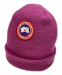 CANADA GOOSE（カナダグース）の古着「ロゴワッペンニット帽」｜ピンク