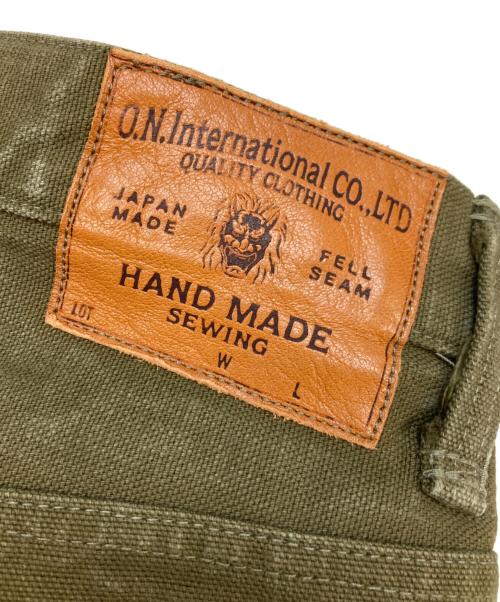 ONI DENIM（オニデニム）ONI DENIM (オニデニム) 硫化染め ハンドメイド リラックステーパードパンツ オリーブ サイズ:33の古着・服飾アイテム