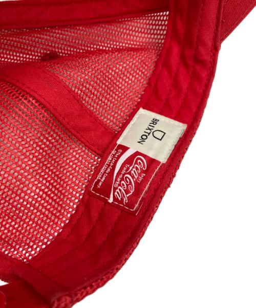 Coca Cola（コカコーラ）Coca Cola (コカコーラ) BRIXTON (ブリクストン) キャップ レッドの古着・服飾アイテム