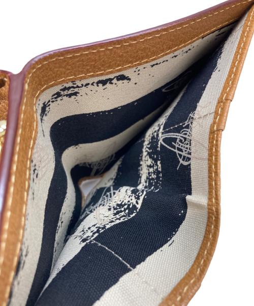 Vivienne Westwood（ヴィヴィアンウエストウッド）Vivienne Westwood (ヴィヴィアンウエストウッド) EXECUTIVE  口金ミニ財布 ベージュの古着・服飾アイテム