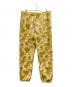 A BATHING APE（アベイシングエイプ）の古着「COLOR CAMO SHARK SWEAT PANTS」｜イエロー