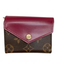 LOUIS VUITTON（ルイ ヴィトン）の古着「3つ折り財布」｜ブラウン・レッド